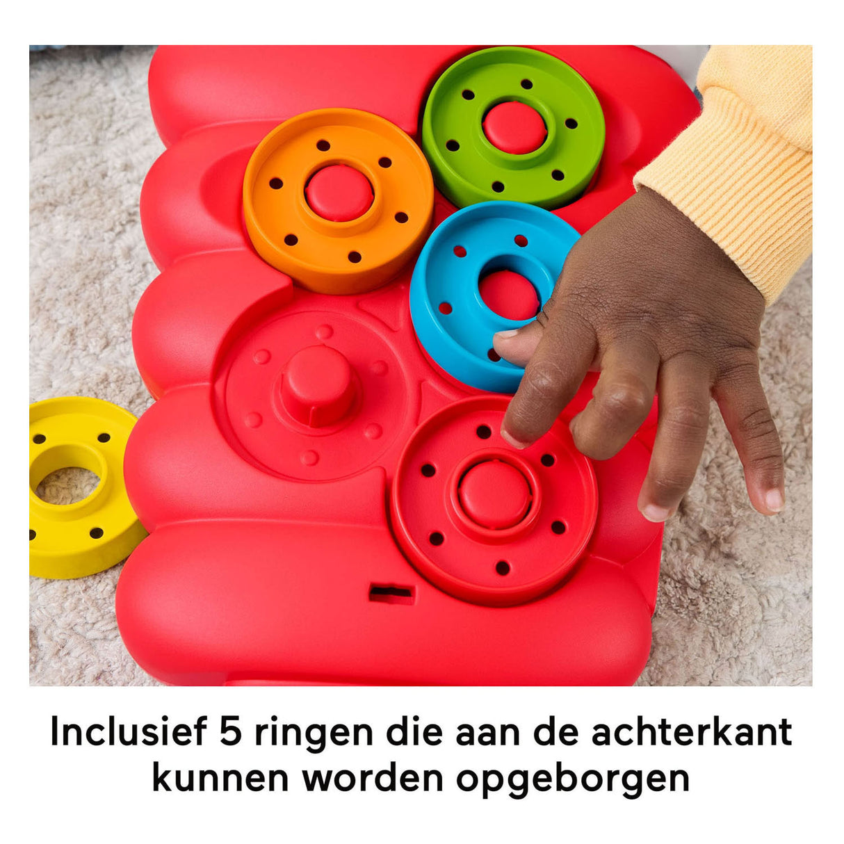 Fisher-price rollende ringen in wiebelende stapeltoren