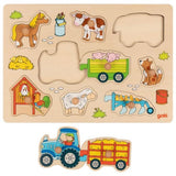 Knoppuzzel tractor met aanhangers. 9 del
