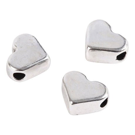 Creativ company http: www.cchobby.nl space-kralen-afm-5-5x7-mm-gatgrootte-1-mm-verzilverd-3-stuk-1-doos