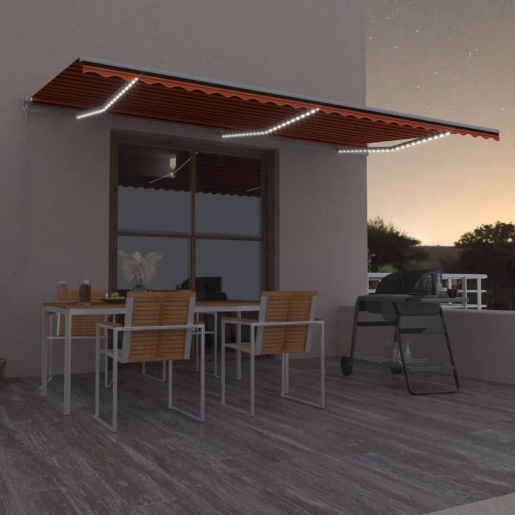VidaXL Luifel handmatig uittrekbaar met LED 600x300 cm oranje en bruin