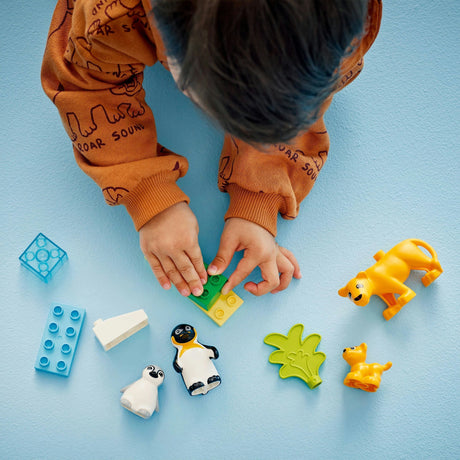 Lego duplo town 10442 families van wilde dieren: pinguïns en leeuwen